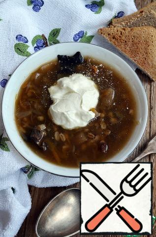 It is ideal to serve such soup with sour cream and garlic croutons.