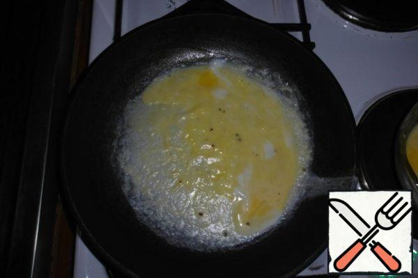 Fry two pancakes in a preheated frying pan.