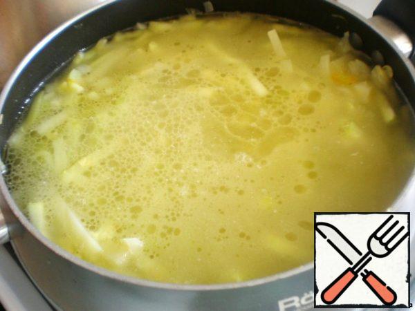 Add chicken broth and cook until the vegetables are tender.