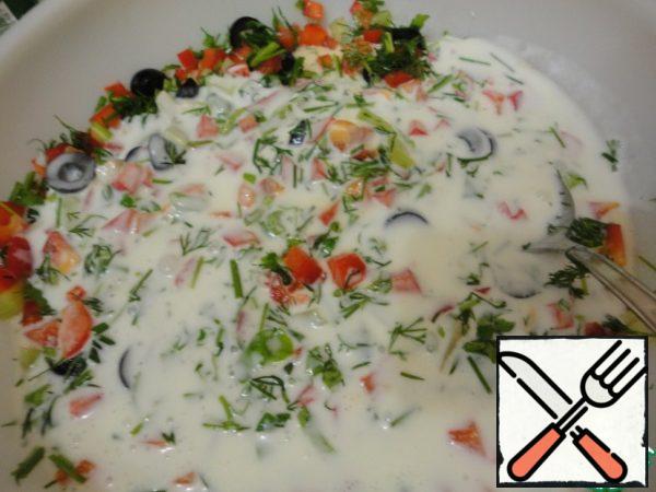 Add olive oil, milk, yogurt, salt, pepper. Mix well. Pour on plates, decorate with vegetables and immediately serve.