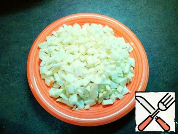 Celery is also cleaned and cut into cubes.
