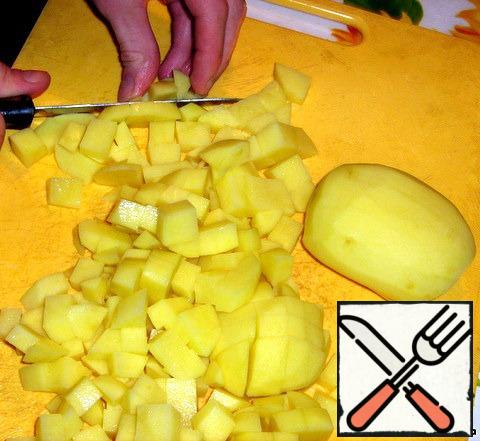 Cut potatoes and put to boil.