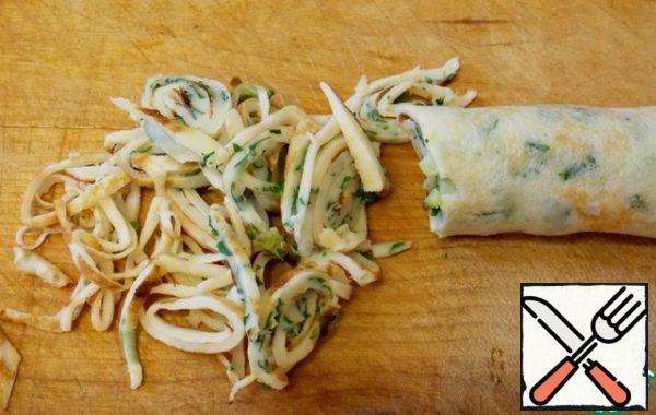 Roll into a roll and slice thinly.