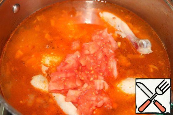 Add the tomatoes, which is pre-remove skin and cut into cubes.