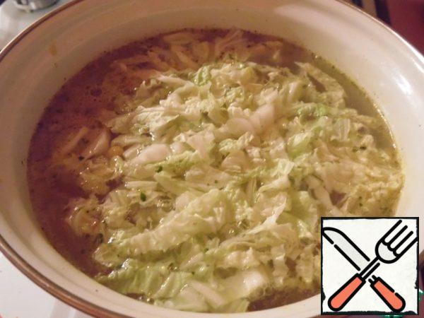 In the soup add the cabbage and corn, cook for 3 minutes.