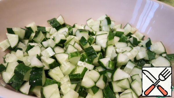 Slice the cucumbers.
