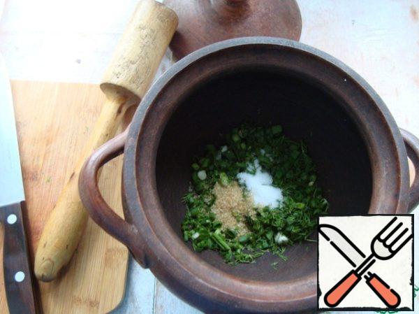 Put it in a bowl.
I cook okroshka in clay pots.
Add 1 tsp sugar and 1 tsp salt to the onion and dill.