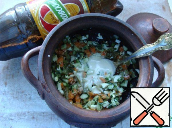 Put everything in a pot and add either mayonnaise or sour cream.
It's for your taste.
Mix everything and pepper to taste.