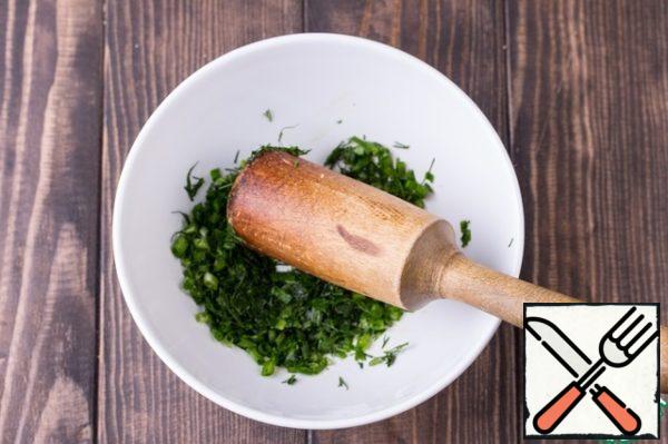 Finely chop the onion and dill and rub it well with salt to add more flavor.
