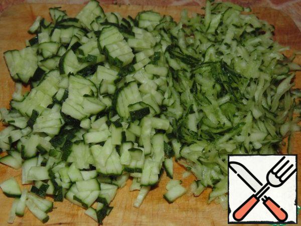 Two cucumber cut into strips, one to grate it.
So it turns out more fragrant.
