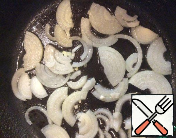 Onion cut into half rings and fry until Golden brown.