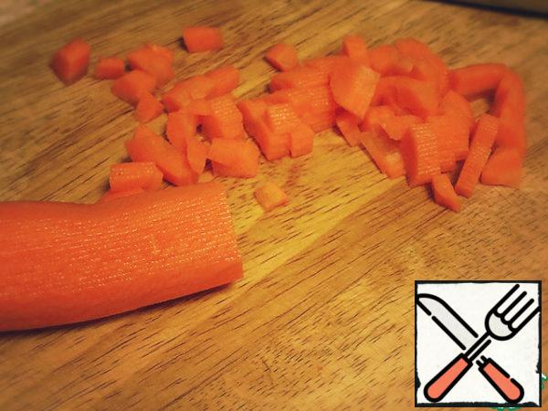 Carrot cut into cubes.