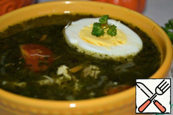 Serve the soup with boiled egg.