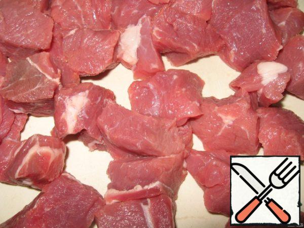 Cut the meat into pieces.