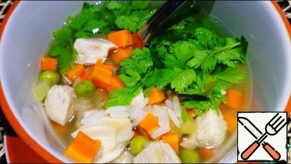 Before serving, chicken fillet and parsley are added to the soup.