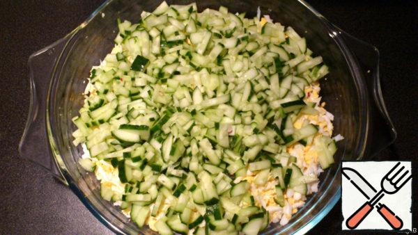 - Cut cucumbers into small cubes.
