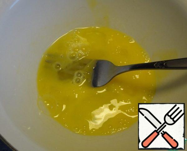 Beat egg in a separate bowl.