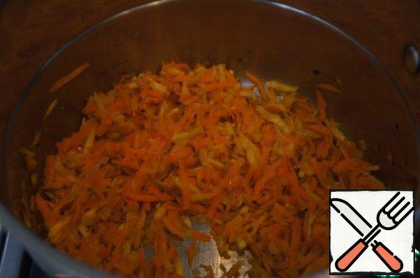 Add the carrots and celery and fry until soft.