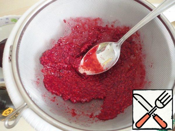 Rub the raspberries through a sieve.
