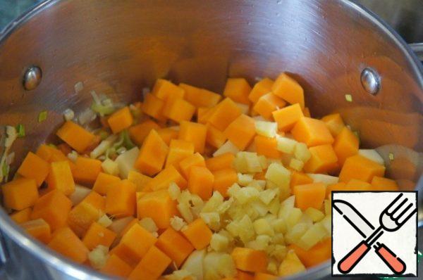 Add pumpkin, potatoes and ginger and fry for 3 minutes.
