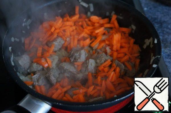 Then add carrots and fry until Golden color.