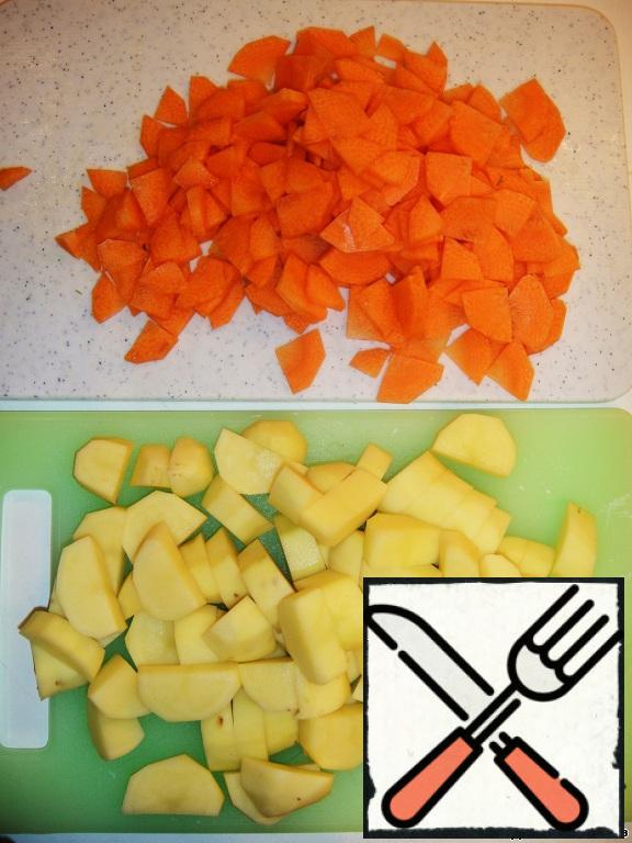 Meanwhile, cut potatoes and carrots in small cubes or slices.
