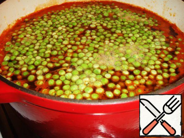 Pour half of the chopped herbs and frozen green peas into the soup, bring to a boil and cook for another 10 minutes, then remove from heat and remove the Bay leaf.