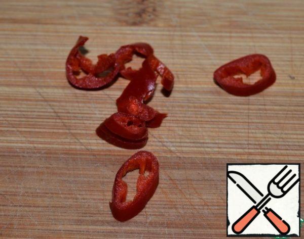 1/3 hot pepper, cut. Add in the saucepan.