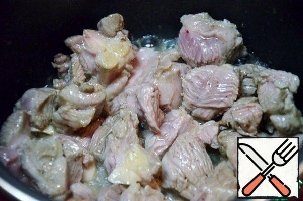 Remove the finished bacon from the pan, and fry the meat in the remaining fat.
