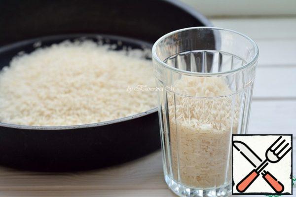 In a baking dish and pour the rice.