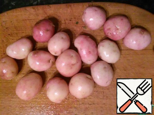 Peel the potatoes.
