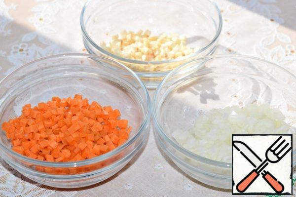 Onions, carrots and celery cut into small cubes.
