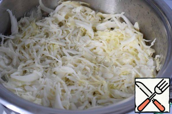 Open the lid of the frying pan. Here's what our vegetables look like in 15 minutes.