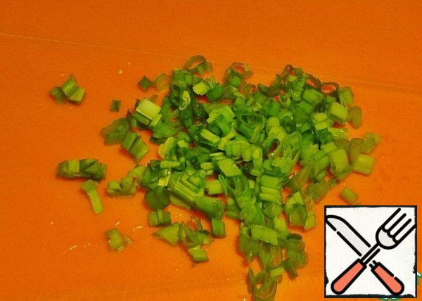 Finely chop the green onions and put them in the soup when serving.
