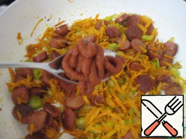 Add tomato paste, mix well.
