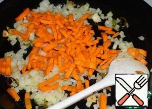 Add carrots. And fry couple of minutes.