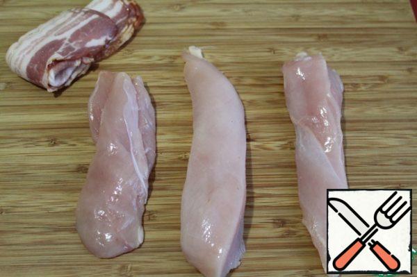 Cut the chicken breasts into thin strips-one breast into 3 strips.