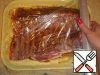 Wrap the tray with cling film and send to marinate in the fridge for 12-20 hours.