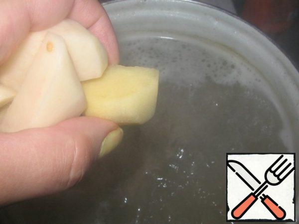 Add potatoes to broth.