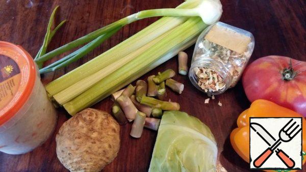 Cook broth with dry roots, bulbs and slices of celery root.