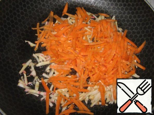 Add carrots, cut into small strips. 