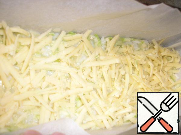 Put the resulting mixture in a prepared baking dish. Sprinkle with Parmesan and remaining cheese.