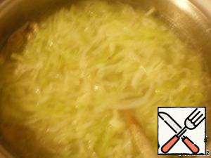 Cabbage cut into strips and drop in boiling meat broth, cook 10-15 minutes.