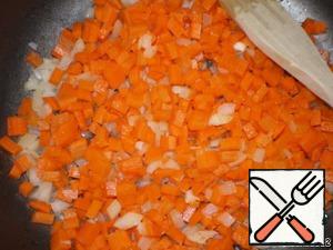 On oil (butter or vegetable) fry onion, then add carrots.
All the vegetables cut into cubes.
