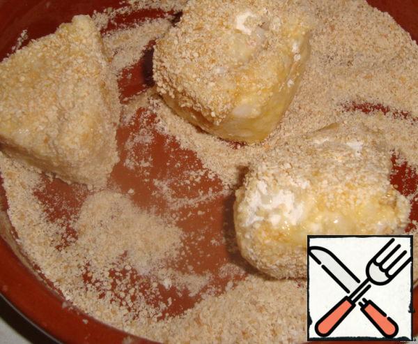 Before you fry, each piece of roll first in flour, then in the egg, then in breadcrumbs.