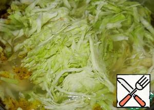 To the potatoes add the cabbage and cook for 3-5 minutes.