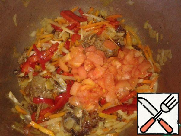 Then add tomatoes and finely chopped potatoes.
