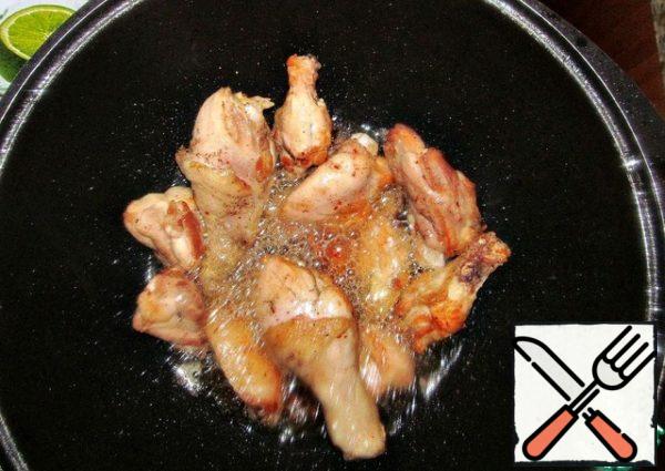 Fry the chicken on high heat. Pinch of salt, black pepper, dry adjika (dry crushed chili).