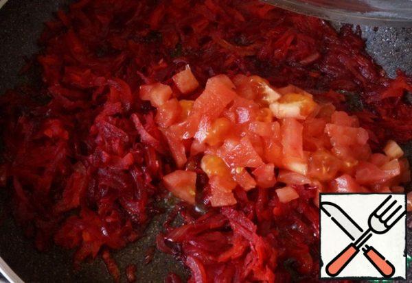 Fry the beetroot for five minutes until tender, add the peeled and diced tomato.