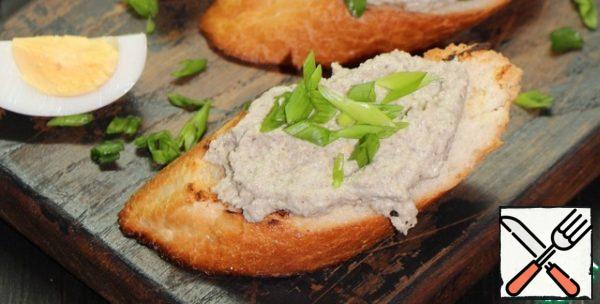 Spread pate, sprinkle with green onions.